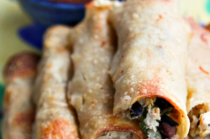 Baked Cheesy Chicken and Bean Taquitos from foodiewithfamily.com