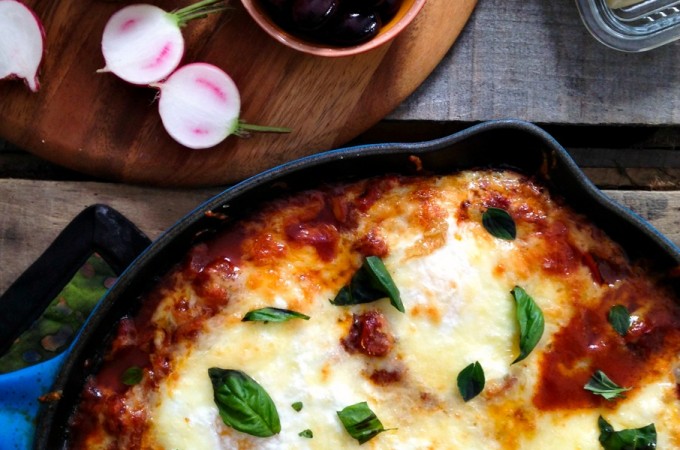 Portuguese Style Baked Eggs. Spicy tomato and red pepper sauce, three cheeses, fresh herbs from foodiewithfamily.com