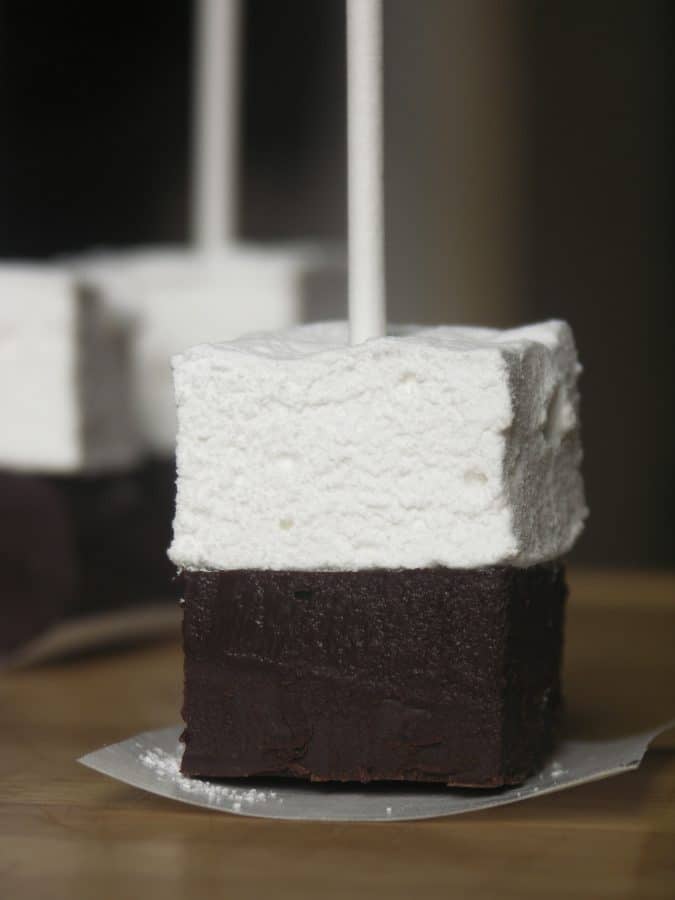 Hot Chocolate on a Stick: This creamy chocolate fudge topped with marshmallow can be left in its pure form and nibbled, or swirled through hot milk for decadent hot chocolate. 