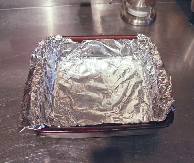 This pan is prepped for the fudgey chocolate part of Hot Chocolate on a Stick: This creamy chocolate fudge topped with marshmallow can be left in its pure form and nibbled, or swirled through hot milk for decadent hot chocolate. 