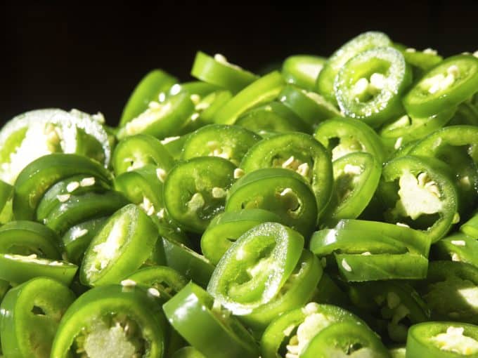 Candied Jalapenos a.k.a. Cowboy Candy or Sweet Pickled Jalapeños 7 3 pounds of jalapenos sliced for Candied Jalapenos from foodiewithfamily.com