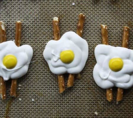 Super cute Bacon and Eggs Candy is done in about five minutes and only requires three ingredients. Tuck some into Easter baskets or surprise your favorite sweet-tooth with a plate of these tonight.