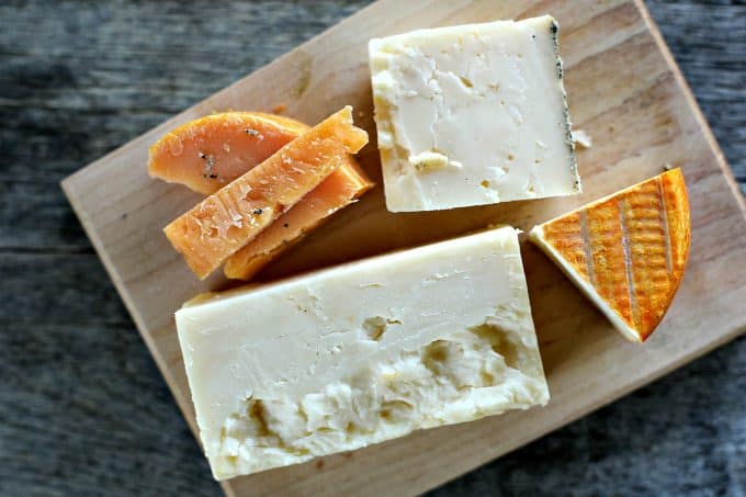 Fromage Fort is a thrifty but fabulous French solution to odds and ends of cheese in your refrigerator. It's as easy as throwing a bunch of grated cheese, a little garlic, and a splash of white wine in a food processor!