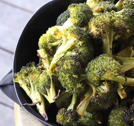 Spicy Asian Broccoli: Long spears of broccoli are tossed with Chinese chile-garlic sauce, minced fresh garlic, sesame oil, a bit of raw sugar and this and that then roasted until crisp-tender. This will beat every white cardboard takeout container of Chinese you can get anywhere without exception.