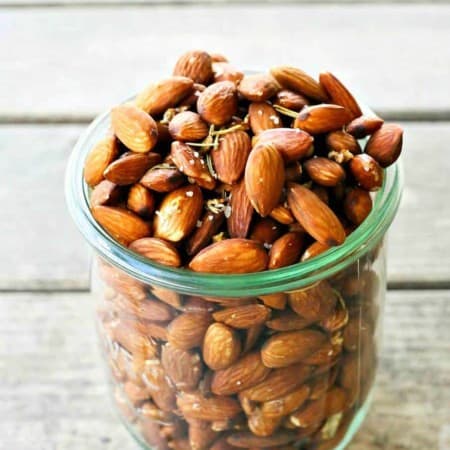 Slow Roasted Rosemary Garlic Almonds are an easy, healthy snack for warm weather months.