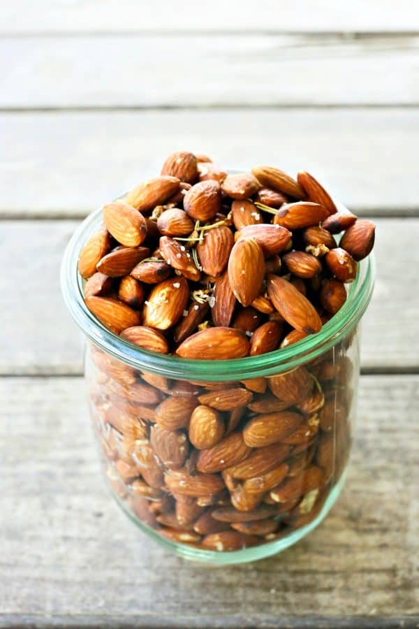 Slow Roasted Rosemary Garlic Almonds are an easy, healthy snack for warm weather months.