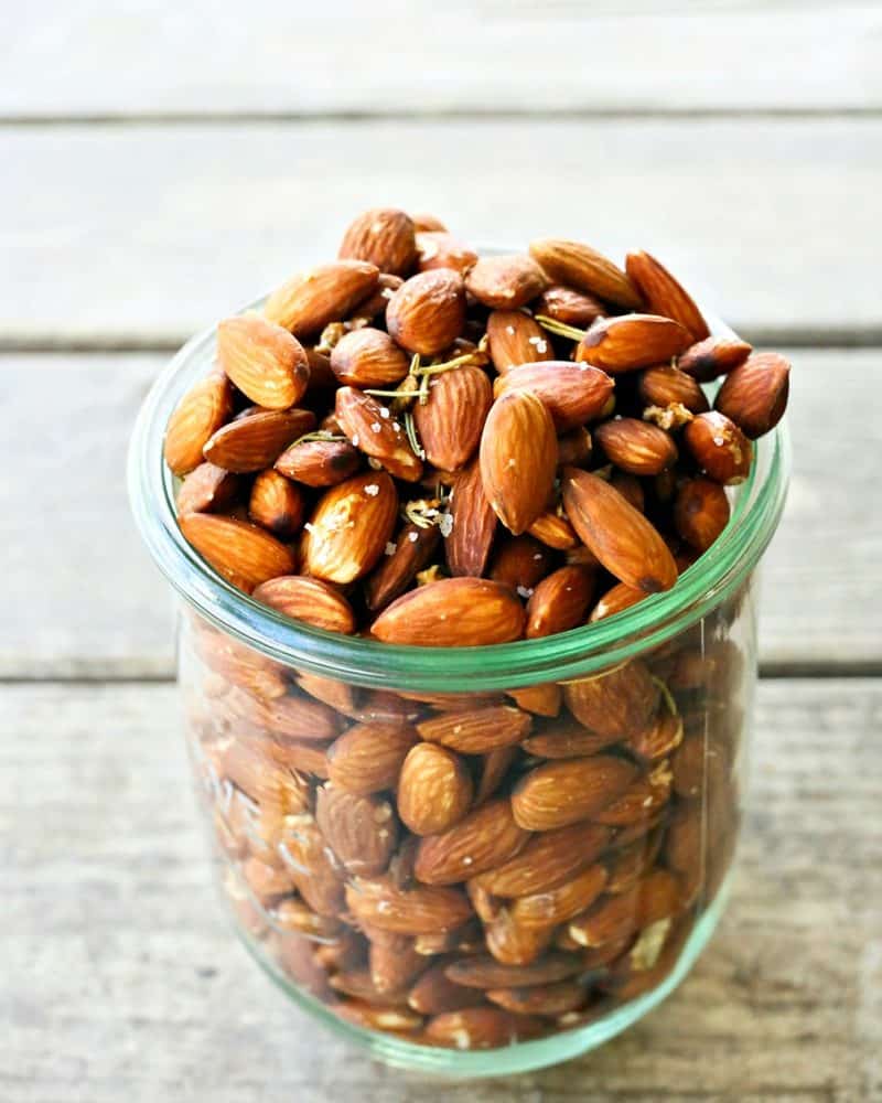 Slow Roasted Rosemary Garlic Almonds are an easy, healthy snack for warm weather months.