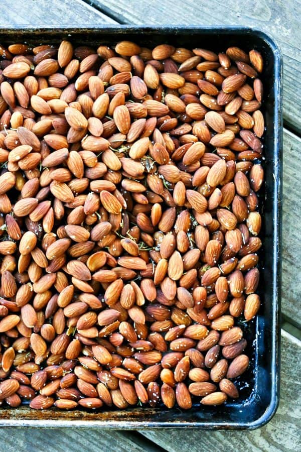 Slow Roasted Rosemary Garlic Almonds are an easy, healthy snack for warm weather months.