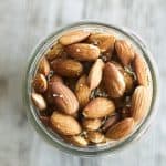 These fragrant and toasty rosemary garlic almonds slow-roast in an ultra low oven overnight (so as not to destroy all those good fats that almonds contain) while you sleep. When you wake, you are in possession of one ultimately sustaining and habit forming snack. Make yourself nuts today! In a good way!
