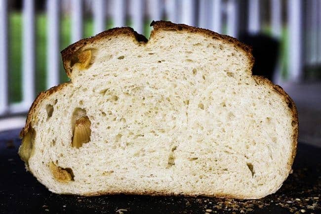 A sliced Roasted Garlic Rustic Sourdough Boule | www.foodiewithfamily.com