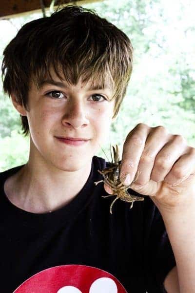 Aidan with crawfish | www.foodiewithfamily.com