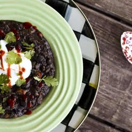 A bowl of Brazilian Black Bean and Sweet Potato Stew | www.foodiewithfamily.com