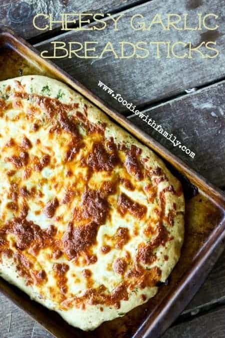 Cheesy Garlic Breadsticks from www.foodiewithfamily.com