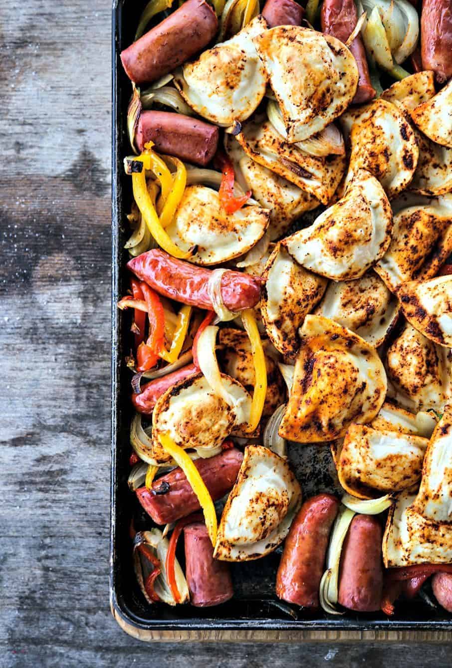 https://www.foodiewithfamily.com/wp-content/uploads/2014/01/Kielbasa-and-Pierogies-Sheet-pan-Meal-1.jpg