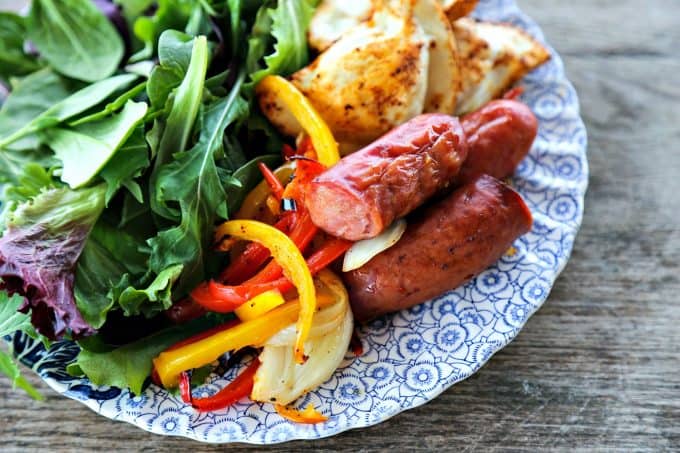 Kielbasa and Pierogies Sheet Pan Meal with juicy roasted kielbasa, crisp tender peppers and onions and puffy, potato filled pierogies.