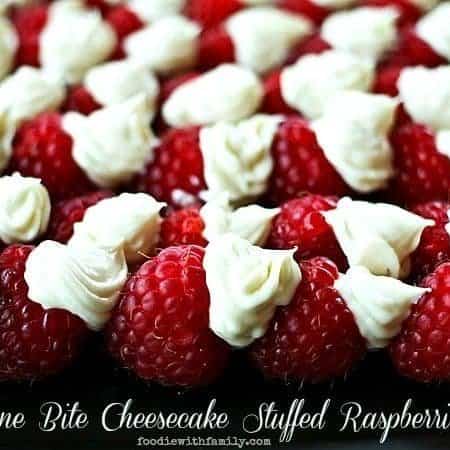 One Bite Cheesecake Stuffed Rasperries with Chambord foodiewithfamily.com #cheesecake #Dessert