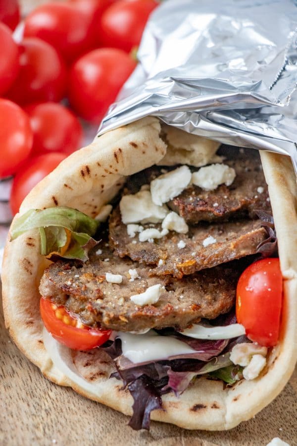 Make restaurant worthy homemade gyro meat and gyros -flat breads filled to bursting with garlicky, herbed, crisped strips of Greek/Lebanese meatloaf.