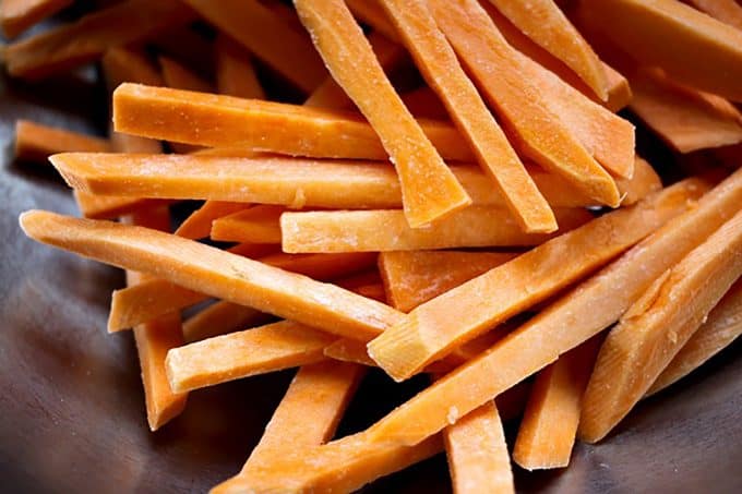 Guaranteed Crispy BAKED Sweet Potato Fries from foodiewithfamily.com