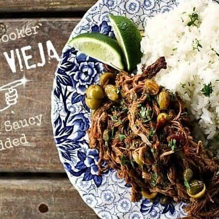Ropa Vieja: Thin shreds of flank steak braised in a rich tomato vegetable sauce with olives &capers. Prepare in an Instant Pot OR Slow-Cooker.