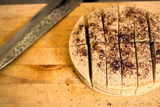 Prepping Baked Za'atar Tortilla Strips for Salad or Snacking