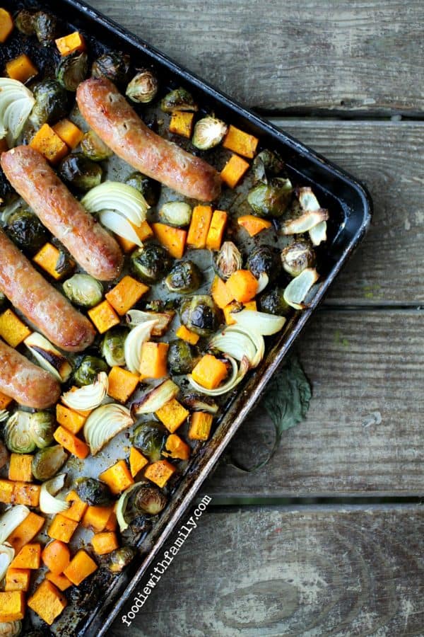 Roasted Fall Vegetable and Italian Sausage Sheet Pan Meal with Brussels sprouts, butternut squash, and onions from foodiewithfamily.com