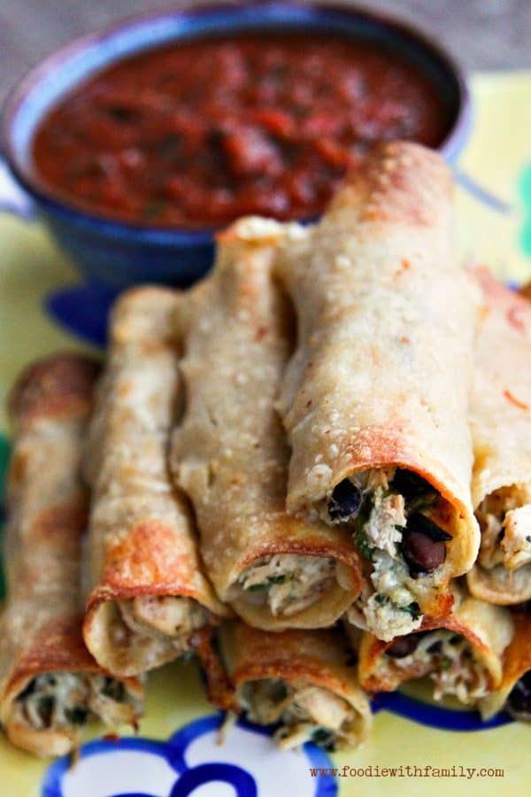 Baked Cheesy Chicken and Bean Taquitos from foodiewithfamily.com