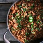 Tex Mex Mash: smashed pinto beans, seasoned browned ground beef, and crispy bacon simmered in a garlicky, chipotle tomato sauce from foodiewithfamily.com