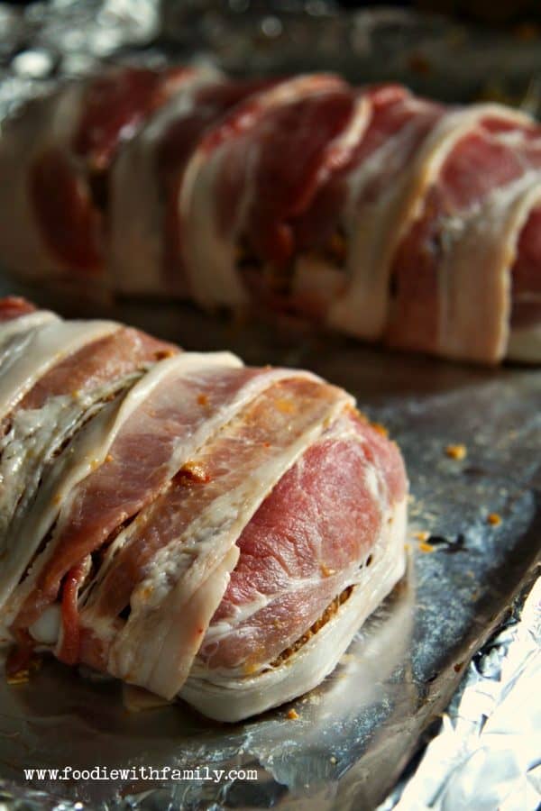 Bacon wrapped around Bacon Jalapeno Meatloaf from foodiewithfamily.com