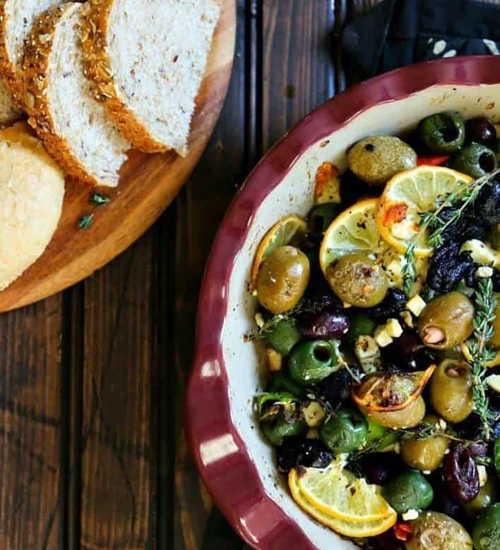 Garlic Roasted Olives with lemon, thyme, feta, and peppers from foodiewithfamily.com