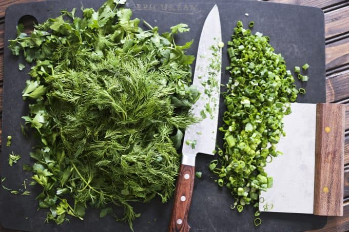 All the herbs for Persian Herb Frittata a.k.a. Kookoo Sabzi from foodiewithfamily.com