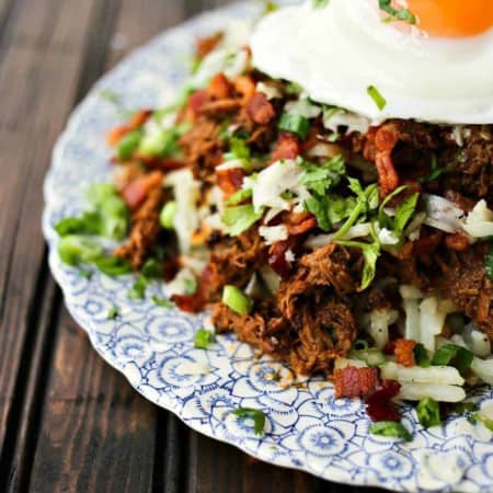 Hash browns with egg cheese beef barbacoa bacon green onions