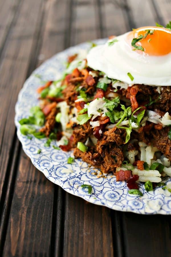 Hash browns with egg cheese beef barbacoa bacon green onions