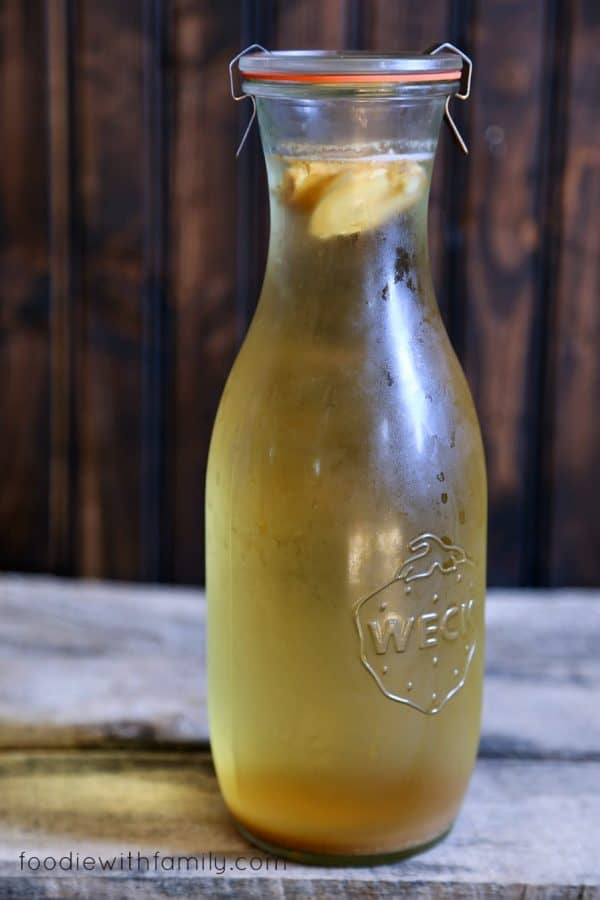 Ginger Switchel Drink made with water, honey, raw apple cider vinegar, and lots of ginger.