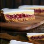 Rhubarb Custard Pie starts with a simple crumb crust that is filled with a tart and sweet rhubarb vanilla filling covered by thin layer of cheesecake and topped with a smooth-as-silk tangy yogurt layer. It's spring and summer perfection, folks.