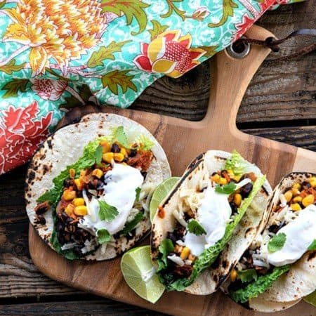 Fast, delicious, fresh, and health and budget friendly, it just doesn't get any better than these Black Bean Tacos. Salsa and chili powder provide massive flavour in this 10 minute meal will fill you up, make you happy, and keep you healthy all at the same time! This is a perfect addition to game day parties and festivities.