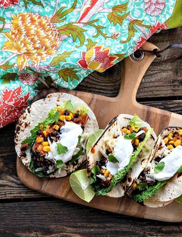 Fast, delicious, fresh, and health and budget friendly, it just doesn't get any better than these Black Bean Tacos. Salsa and chili powder provide massive flavour in this 10 minute meal will fill you up, make you happy, and keep you healthy all at the same time! This is a perfect addition to game day parties and festivities.