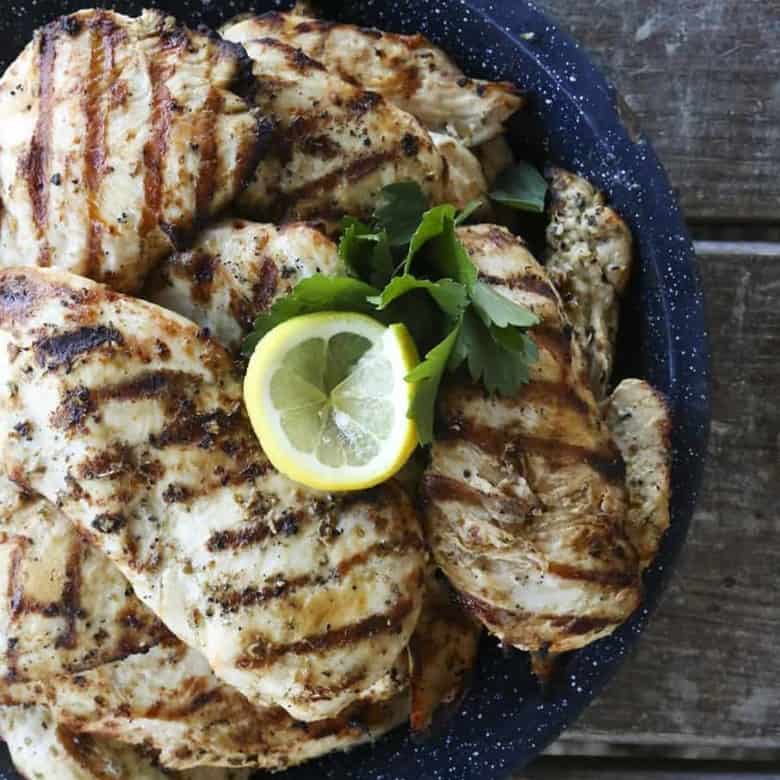 Juicy, grilled Greek Lemon Garlic Chicken from foodiewithfamily.com