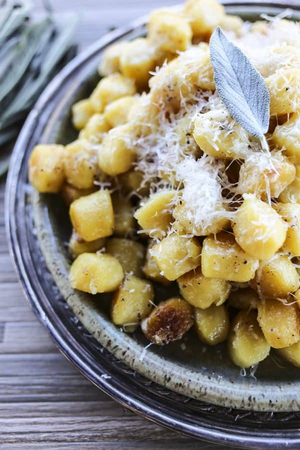 Amazingly easy and comforting Garlic Butter Gnocchi with sage and Parmesan cheese.