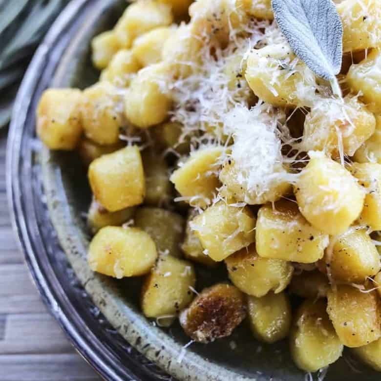 Amazingly easy and comforting Garlic Butter Gnocchi with sage and Parmesan cheese.