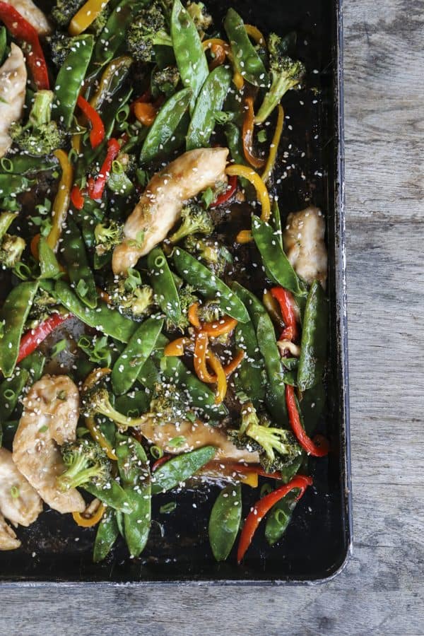 Fabulously fast, filling, and flavourful, this Asian Chicken Stir Fry Sheet Pan Meal will please everyone and feed a crowd economically. 