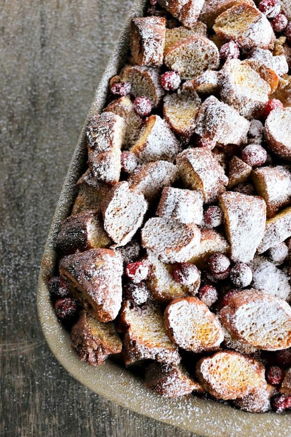 Rich, souffle-like, nutmeg flecked Cranberry Eggnog Doughnut Bread Pudding is the ultimate cold weather dessert. 
