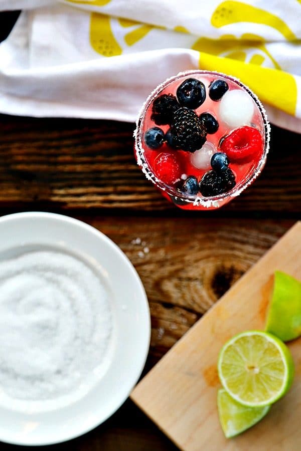Tart and sweet, refreshing berry Kombucha stands in for most of the lime juice in this modern twist on the classic Margarita; Berry Kombucha Margaritas. With or without the traditional salted rim, you'll reach for this on hot days all summer long!