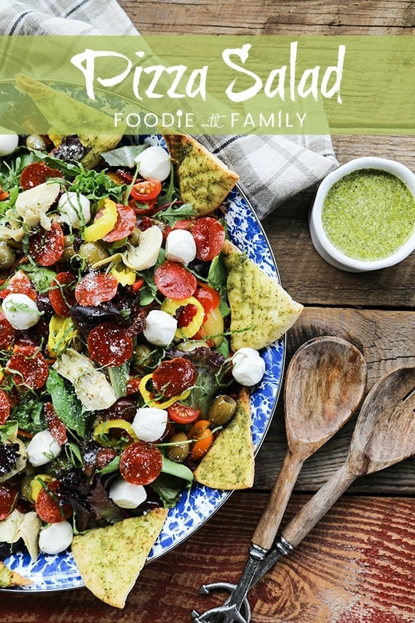 Supreme Pizza Salad: this salad is no boring, average salad. Mixed greens are tossed with crisped pepperoni, pesto pita chips, artichoke hearts, mini mozzarella balls, marinated olives, cherry tomatoes, sun dried tomatoes, pepperoncini, Parmesan cheese and a flavourful pesto vinaigrette.