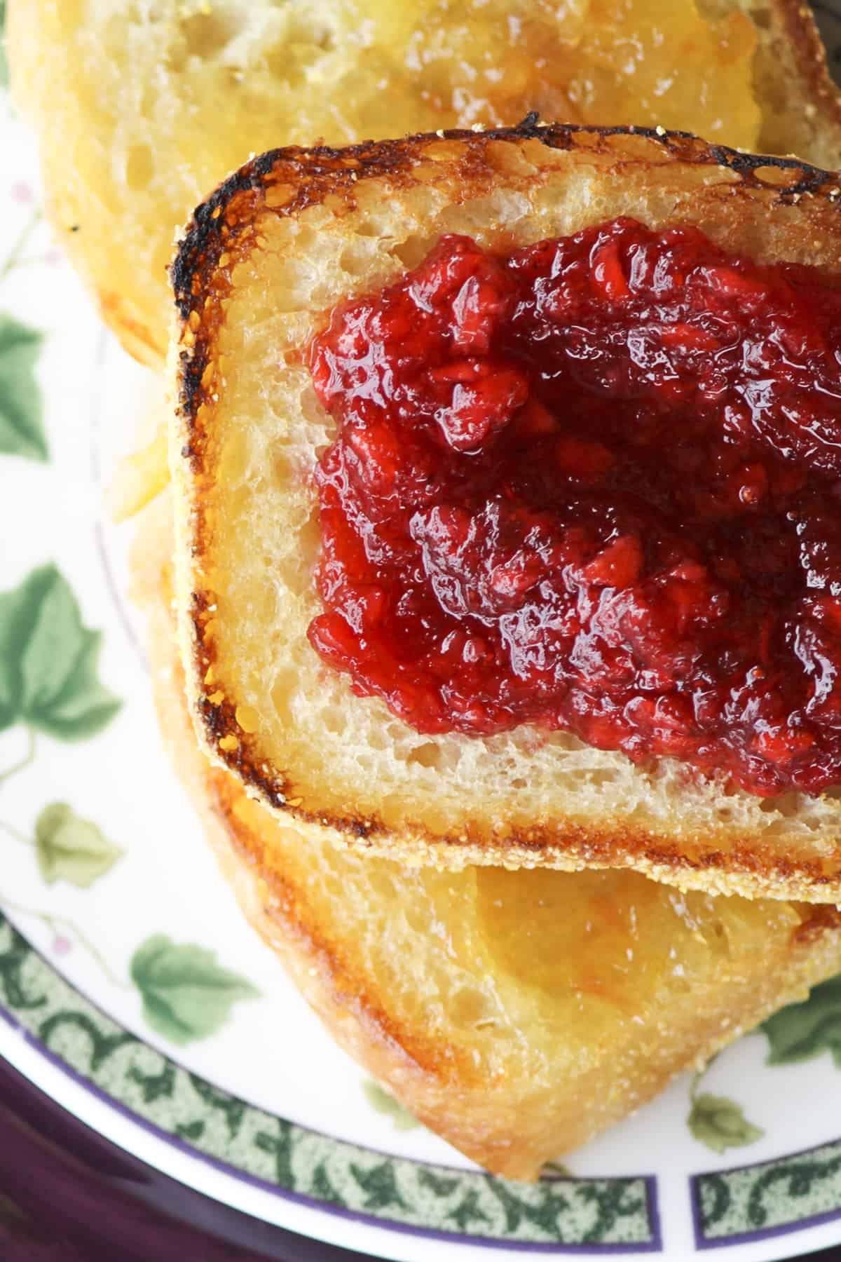 English Muffin Bread topped with strawberry freezer jam and peach freezer jam.