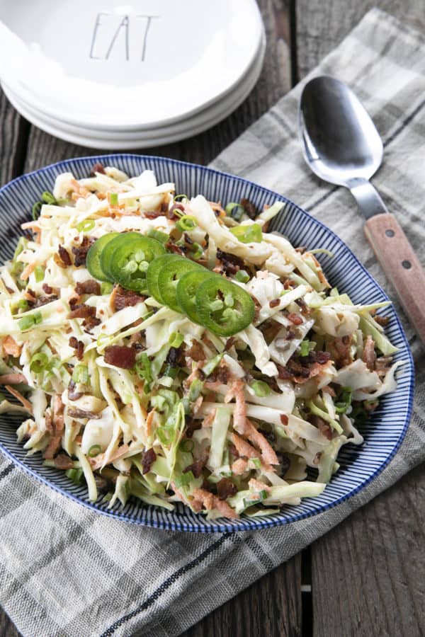 Jalapeno Coleslaw is a deliciously fresh, crunchy, savoury, summery salad to accompany all your grilled main dishes. Creamy, tangy, and easily adjustable to suit your heat-preferences, this super fresh spicy coleslaw is one you'll reach for again and again.