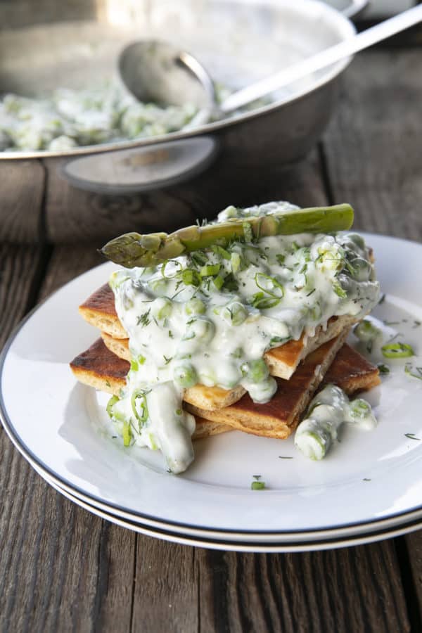 Tender spring peas and asparagus combine in a garden herb cream sauce in this new-fashioned take on delightfully old-fashioned Creamed Peas. Served over toast, this is one simple, economical dish wows!