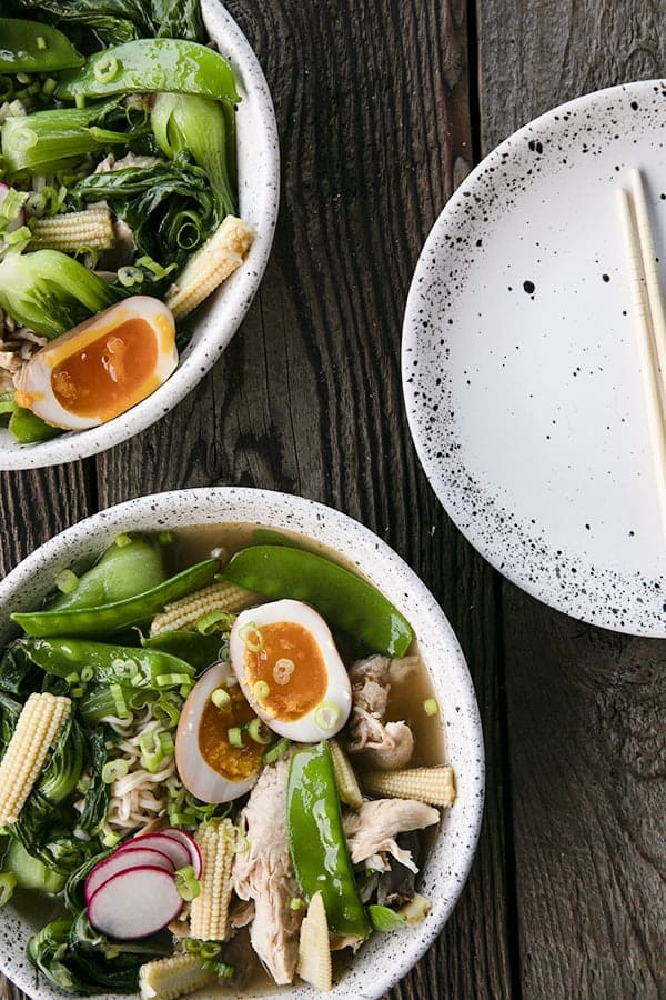 Instant Pot Chicken Ramen with jammy egg, baby corn, pea pods, bok choy, mushrooms, and radishes.