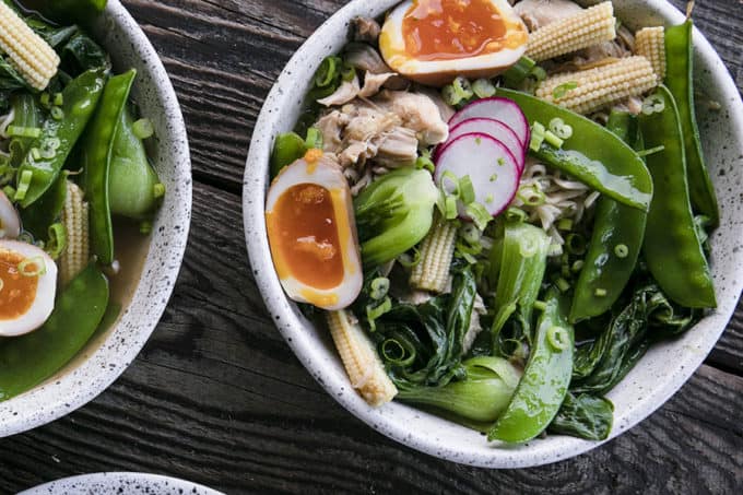 Instant Pot Chicken Ramen with jammy egg, baby corn, pea pods, bok choy, mushrooms, and radishes.