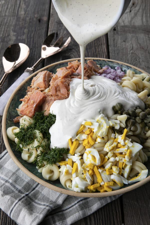 Smoked Salmon Pasta Salad is about to become your new favourite pasta salad. Savoury smoked salmon, a simple creamy dill dressing, hard-boiled eggs, capers, and red onions combine to amp up pasta salad to a whole new level. You'll find yourself craving this!