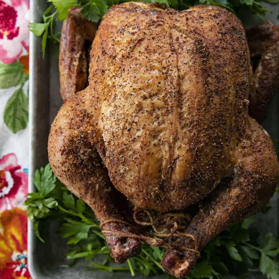 You will never believe how easy and spectacular this smoked whole chicken recipe is until you try it yourself. Full of tips and tricks, this post will help you make the best smoked chicken recipe you've ever had in your life!